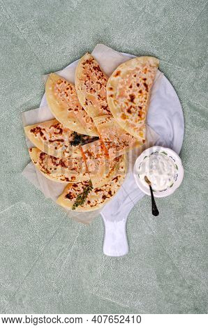 Baked Bread With Vegetable Filling On A Stone Background. Selective Focus.