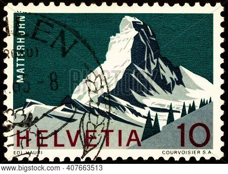 Moscow, Russia - February 09, 2021: Stamp Printed In Switzerland Shows Matterhorn Mountain, 4,478 Me