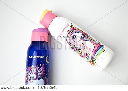 Klang,malaysia:february 11, 2021- Unicorn School Bottles Over White Background. Tupperware Brand