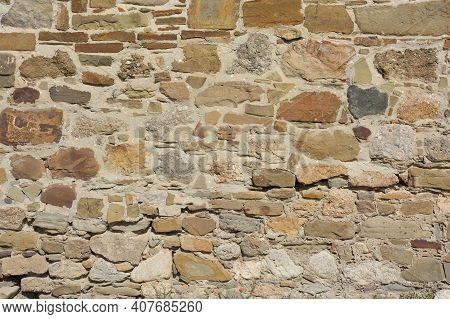 Castle Wall Made Of Old Stones Textures For Design And Photo Background.
