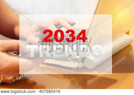 Trends In 2034, A Man Looking At A Smartphone