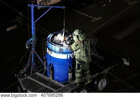 Lubartow, Poland - 11 February 2020: Technician Of Police Bomb Disposal Unit Is Covering Explosive M