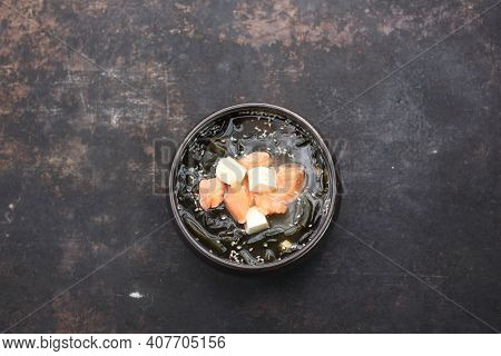 Top View Of A Traditional Japanese Soup With Salmon. The Misoshiru.
