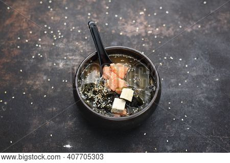 Top View Of A Misoshiru. A Traditional Japanese Soup With Salmon.