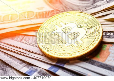 Golden Bitcoin Lies On The Banknotes.new Virtual Money. Crypto Currency Top View. Real Coins Of Bitc