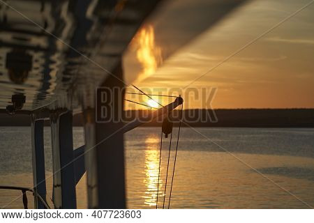 Beautiful And Spectacular Sunset Over A Motor Yacht With Reflections On The White Paint And Details 