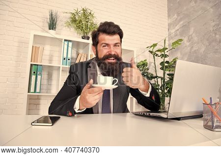 Best Tea. Realtor Give Thumbs Up With Tea Cup. Lawyer Drink Tea In Office. Bearded Man Enjoy Tea Bre