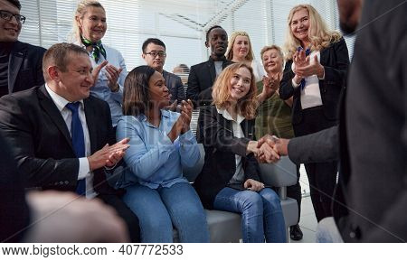 International business partners have introductionary handshake