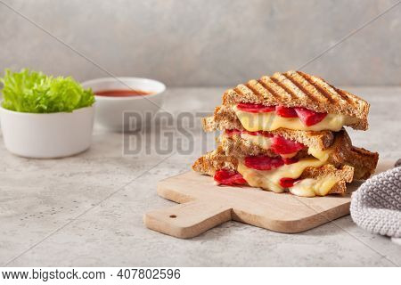 grilled salami and cheese sandwich