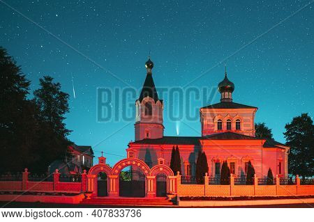 Korma Village, Dobrush District, Belarus. Comet Neowise C2020f3 And Meteor In Night Starry Sky Above