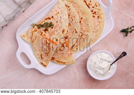 Baked Bread With Vegetable Filling On A Stone Background. Selective Focus.