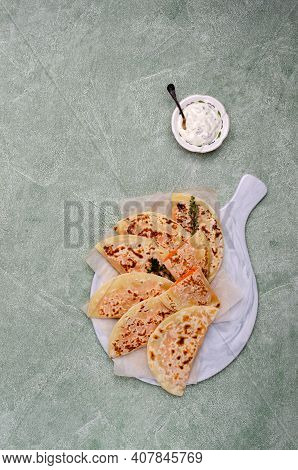 Baked Bread With Vegetable Filling On A Stone Background. Selective Focus.