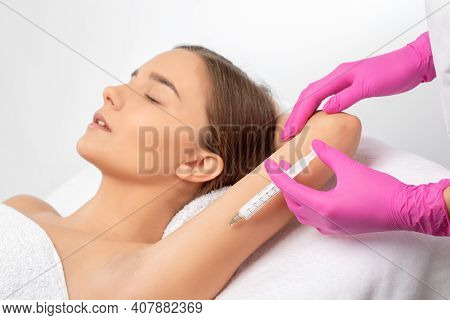 Aesthetic Cosmetologist Makes Lipolytic Injections To Burn Fat On The Arm And Body Of A Woman. Femal