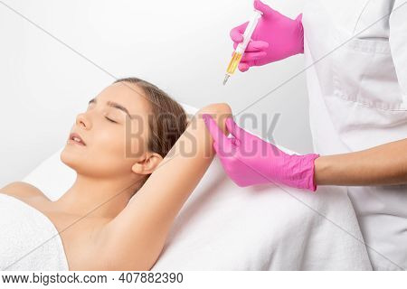 Doctor Doing Stem Cell Therapy On A Patient's Elbow After The Injury. Treating Knee Pain With Platel