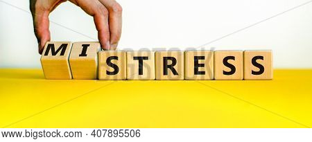 Mistress Or Stress Symbol. Businessman Turns Wooden Cubes And Changes The Word 'mistress' To 'stress