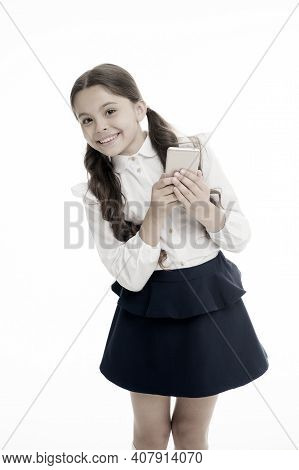 Girl Cute Long Curly Hair Holds Smartphone White Background. Child Girl School Uniform Clothes Holds