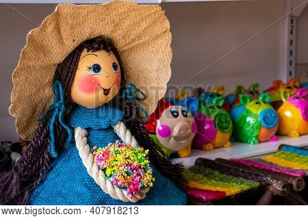 Raquira, Colombia - February 2021. Beautiful Handmade Yute Dolls In The Small Town Of Raquira.the Ci