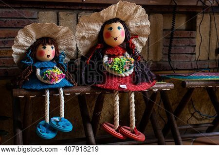 Raquira, Colombia - February 2021. Beautiful Handmade Yute Dolls In The Small Town Of Raquira.the Ci