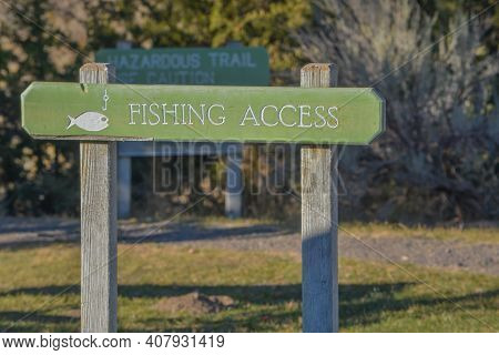 Fishing Sign At The Snake River In The Mountains Of Northern Idaho