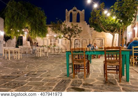 Folegandros, Greece - September 24, 2020: Small Square With Old Church And Restaurants In Chora On F