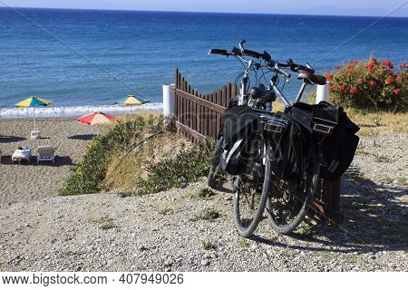 Kamiros, Rhodes / Greece - June 23, 2014: Bicycles In A Beach Near Kamiros, Rhodes, Dodecanese Islan