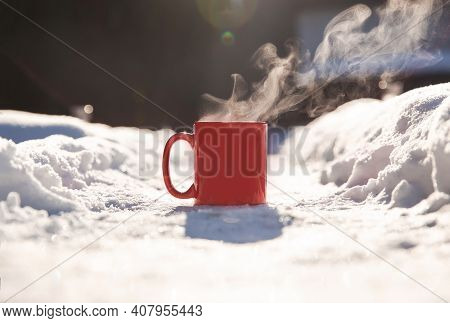 Steaming Cup Of Hot Coffee,tea Or Chocolatemilk In The Cold Fresh White Snow, Winter,cozy,drink,snow