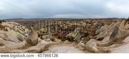 Landscape View Of Uchisar, Cappadocia, Turkey Under Cloudy Sky