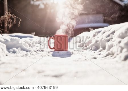 Steaming Cup Of Hot Coffee,tea Or Chocolatemilk In The Cold Fresh White Snow, Winter,cozy,drink,snow