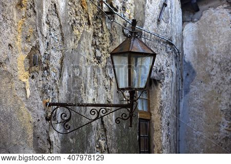 Triora (im), Italy - February 15, 2017: An Old Lamp In The Witches Village Of Triora, Imperia, Ligur