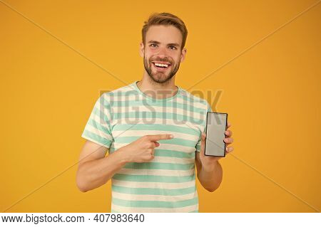 Mobile Services. Free Internet. Application Smartphone. Download And Start Play. Man Pointing At Sma