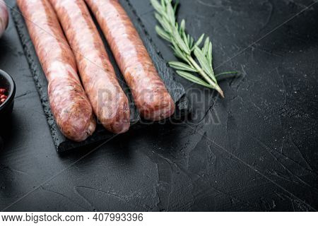 Traditional Raw Mest Sausages, On Black Background.