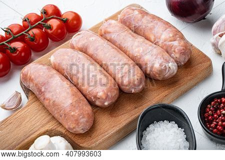 Traditional Mest Sausages, On White Background.on A Wooden Board