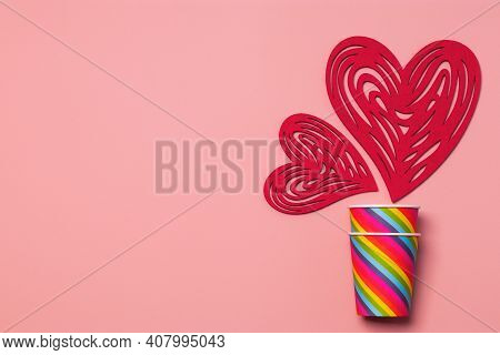 Valentines Day. Paper Cups Rainbow, Hearts On A Soft Pink Background. The Concept Of Gay Pride, Lgbt