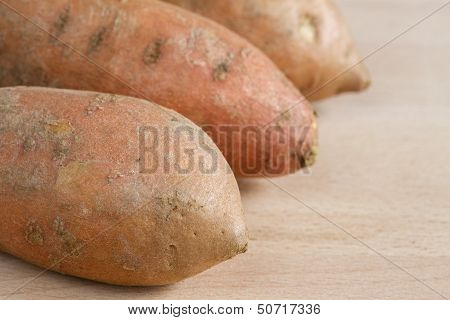 Three sweet potatoes