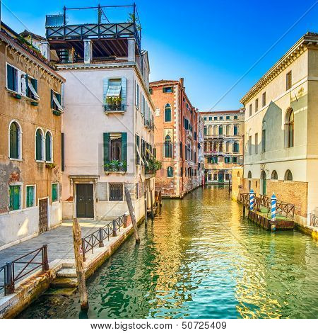 Venice Sunset In Rio Greci Water Canal And Church Campanile. Italy