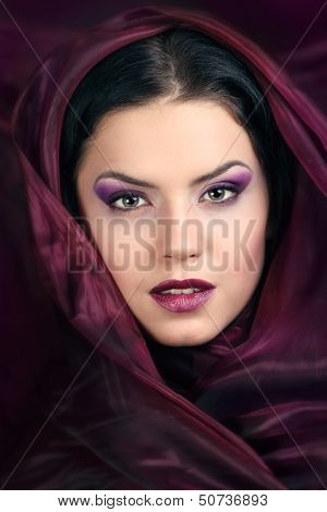 gorgeous woman with purple color scarf