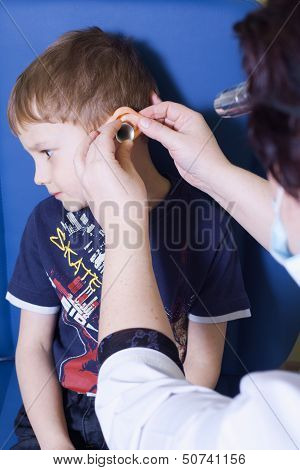 Medical Otitus Examination Of A Child At A Ear Nose Throat Doctor