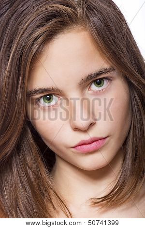 Closeup Portrait Of A Teenage Girl Isolated On White