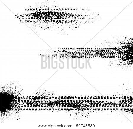 Three tire tracks
