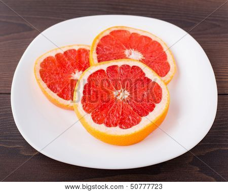 Slice of grapefruit on a palte