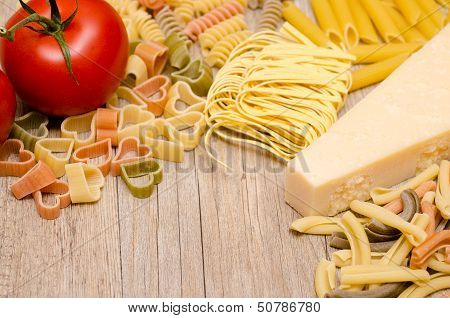 Different Italian Pasta, Pecorino And Red Tomato