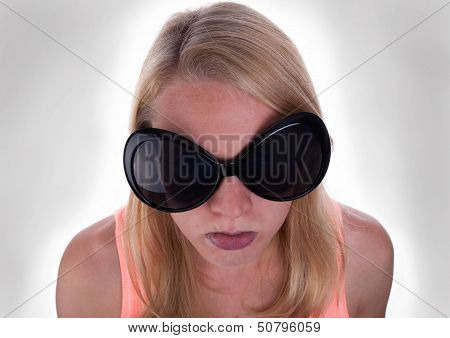 Sulking Teenage With Gray Background