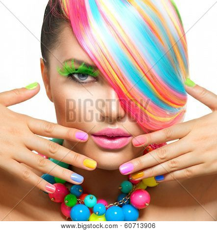 Beauty Girl Portrait with Colorful Makeup, Hair, Nail polish and Accessories. Colourful Studio Shot of Stylish Woman. Vivid Colors. Manicure and Hairstyle. Rainbow Colors 