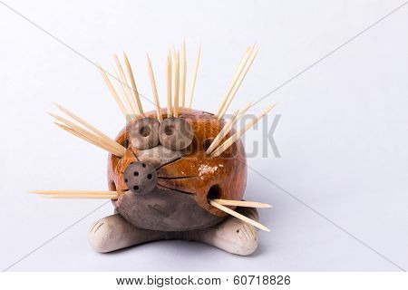 Hedgehog statuette on white