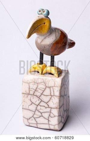 Toucan statuette on white
