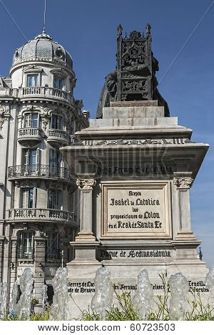 Monument To Isabel La Católica And Cristobal Colon Against Bank Building