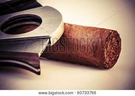 Cigar And Cutter On A White Background