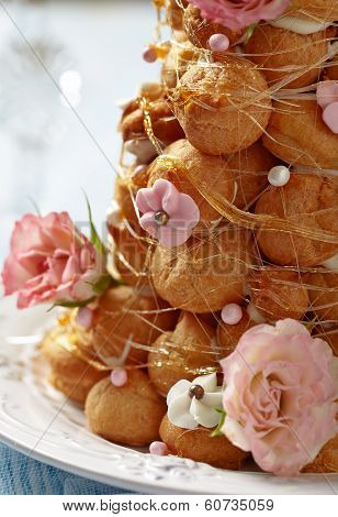 Croquembouche with Pink and White Frosting Roses