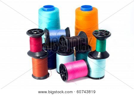 Colorful bobbins of thread isolated