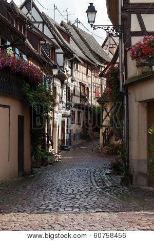Street with half-timbered medieval houses in Eguisheim